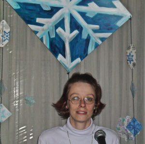 Lauren Renzetti at the Podium for Winter Service at NUUC