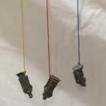 Men Dangling Below Journey of Blue,Red & Yellow by Lauren McKinley Renzetti