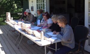 Artist Retreaters working on close views of bark