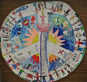 Toronto is a Peaceful City by Hawthorne II Bilingual School, Toronto, grade 2 made this poster , grade 1-6 created signs flags, posters hats and did a parade for peace day, organized by lauren renzetti