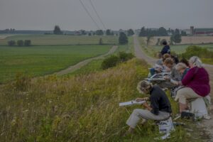 artists drawing the sunset