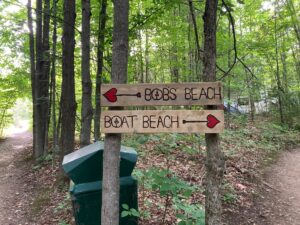 beach signs for unicamp 2023 , wood burned and painted made by lauren renzetti