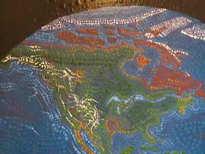 close up of Our Whole Earth by Lauren McKInley Renzetti