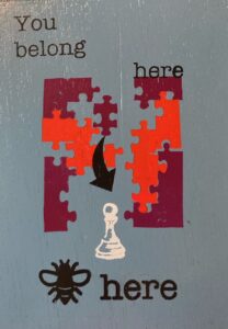 you belong here pawn silkscreen on painted wood lauren mckinley renzetti 2024